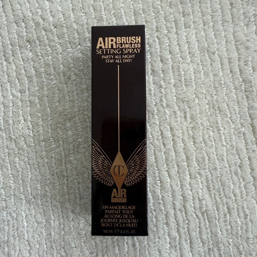 Charlotte Tilbury Airbrush Flawless Setting Spray in Black and Gold